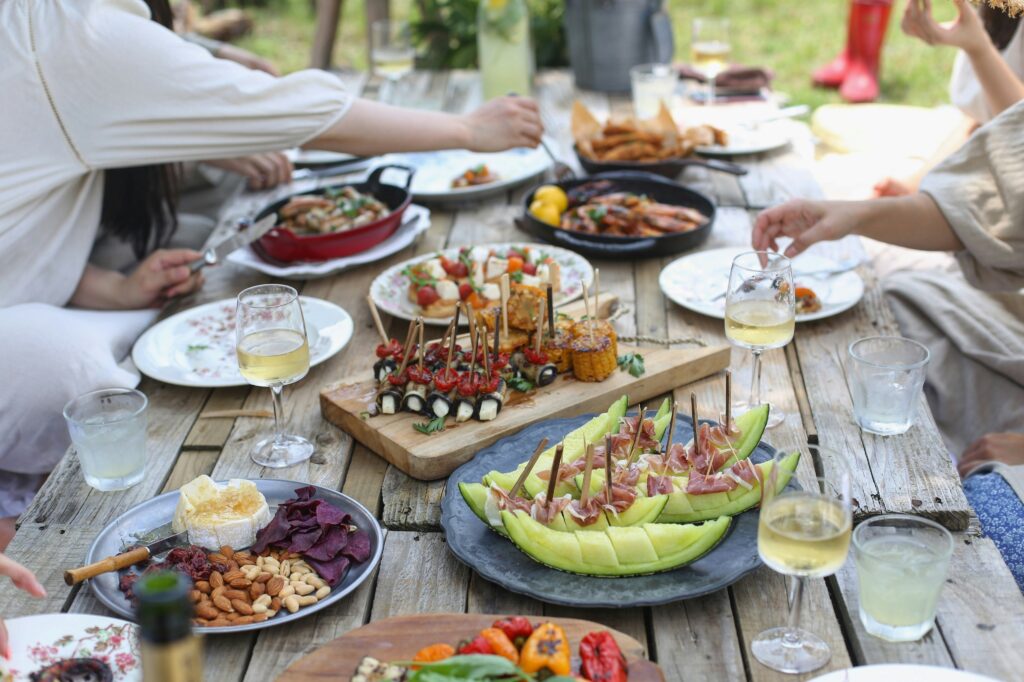 Outdoor table with chic buffet food.