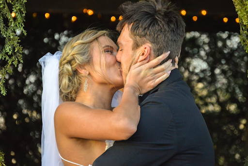 Bride and groom kissing