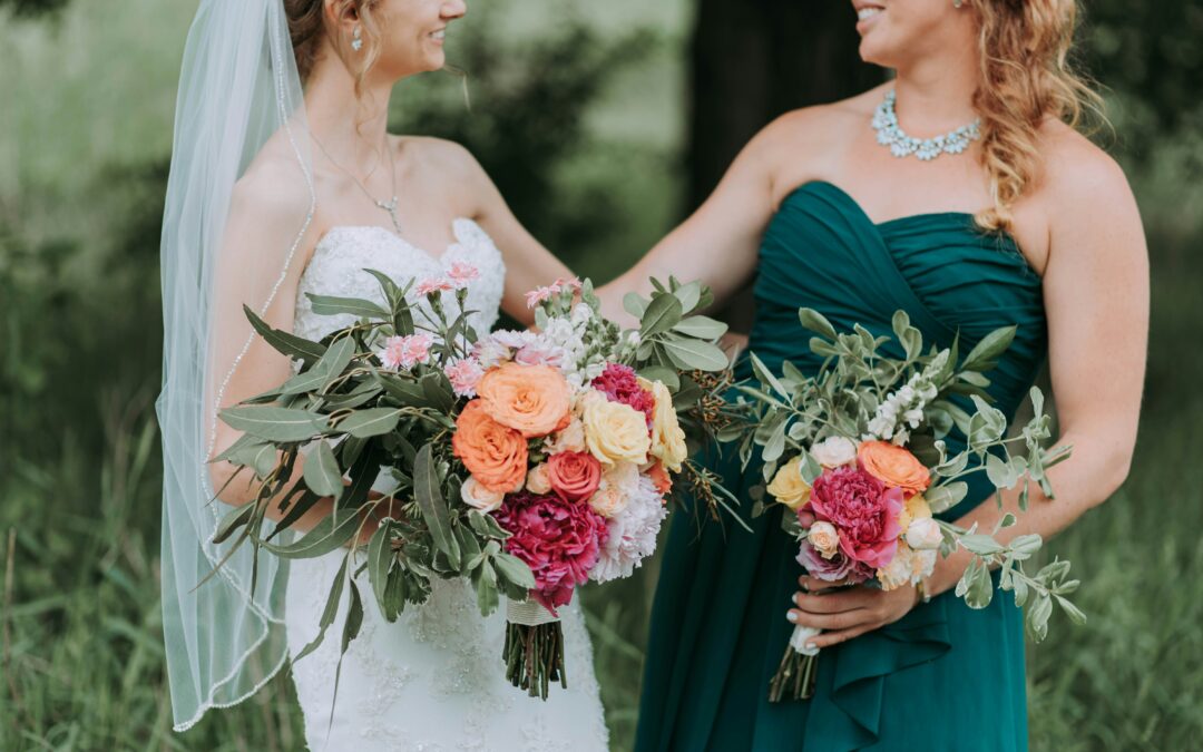 Bride and bridesmaid smiling